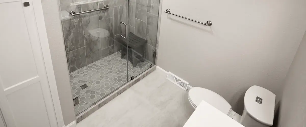 A bathroom floor and a tile floor in the shower