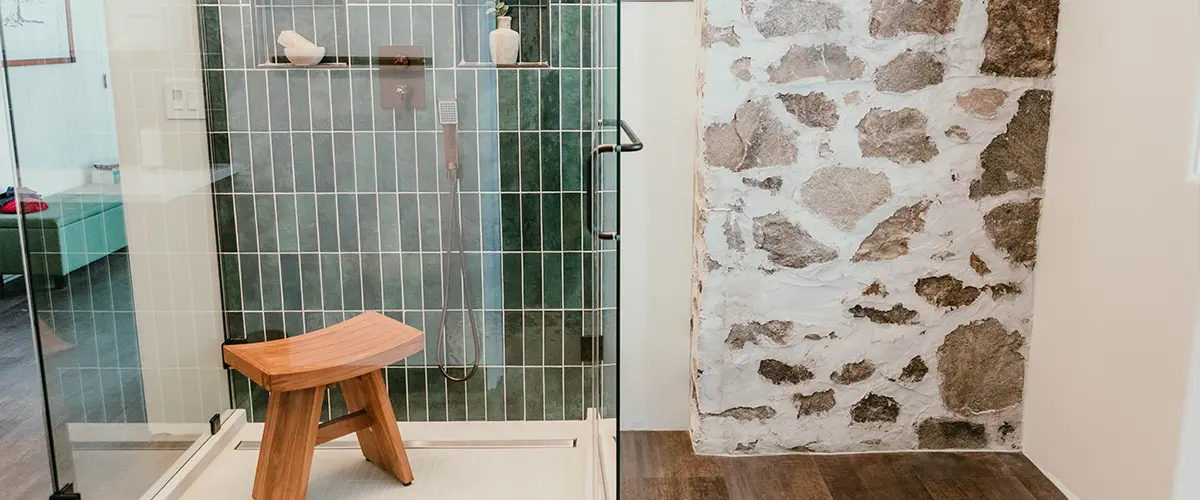 Walk-in shower with glass enclosure