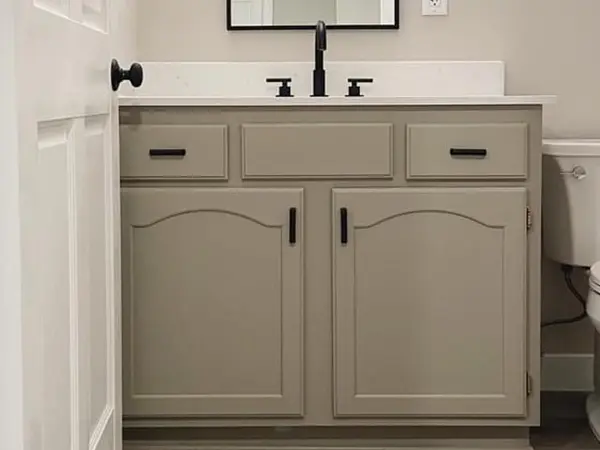 Gray cabinets with black hardware