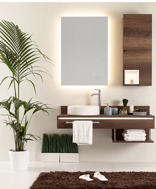 A bathroom with hardwood vanity and cabinet