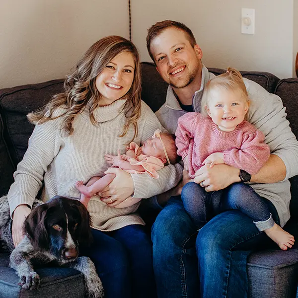 The Pagel family with their two daughters and their dog