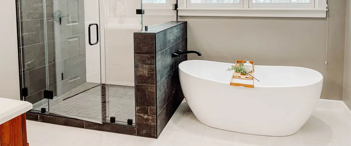 A tub and shower in a bathroom remodel
