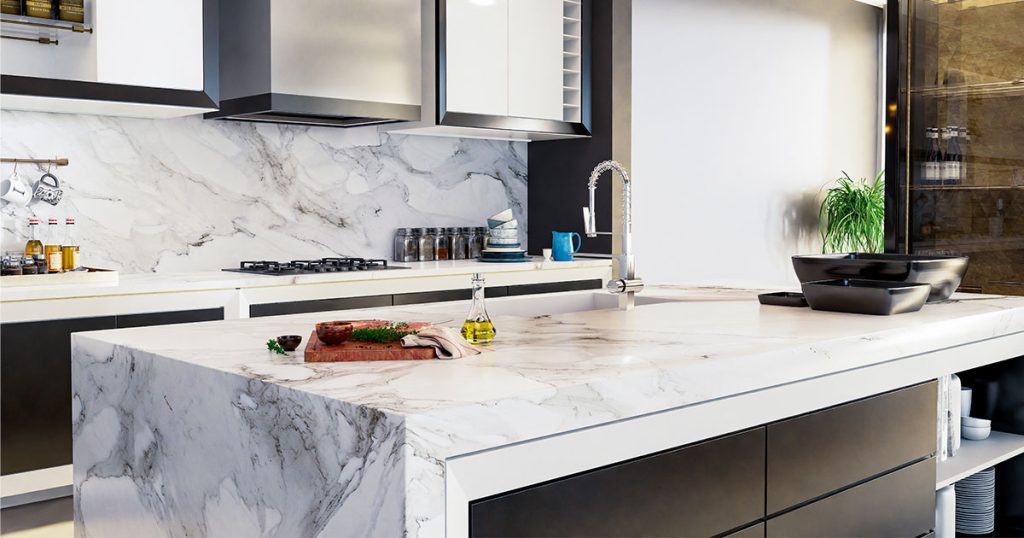 Upscale quartz waterfall countertop in a kitchen
