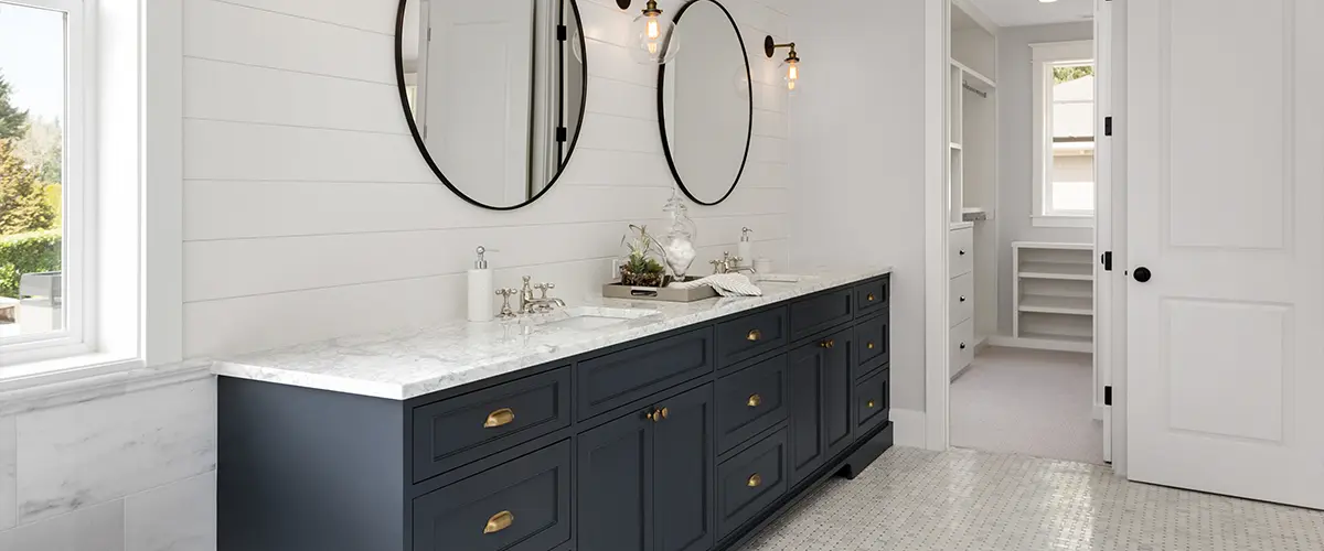 A large navy blue vanity for a bathroom remodel