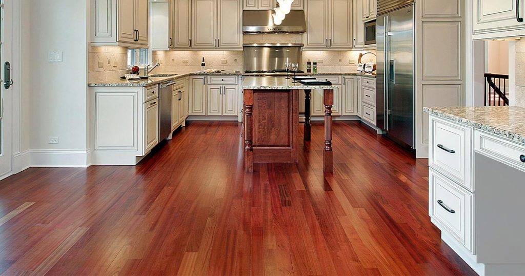 kitchen with red wood flooring as best kitchen flooring