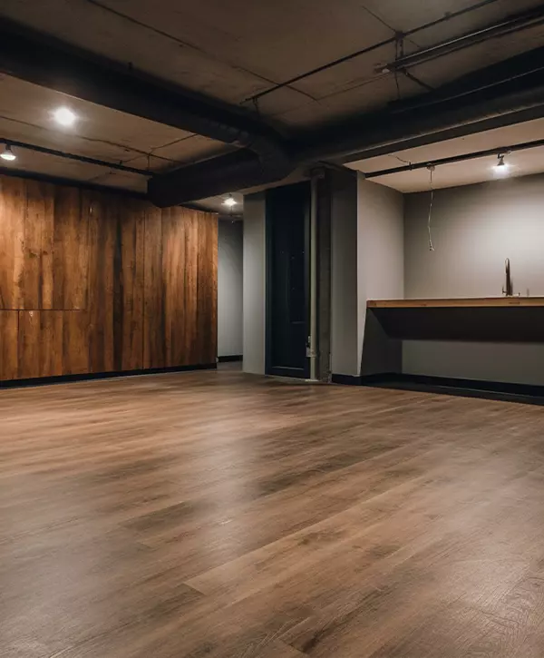 basement remodeling with hardwood floor and lights