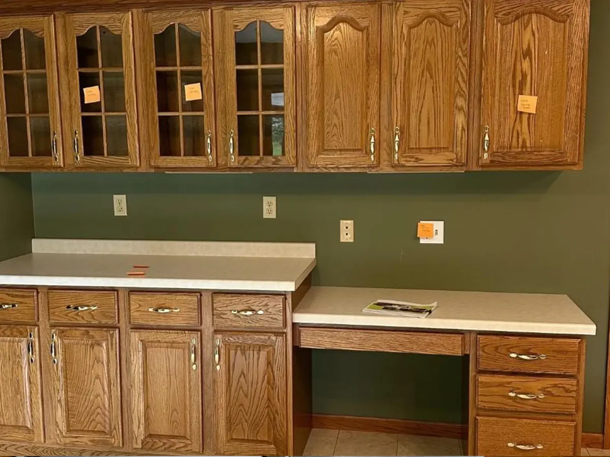 Old wooden kitchen cabinets and counter before renovation