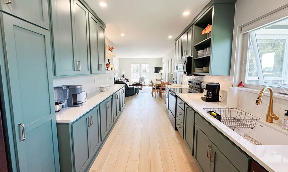 Whole home remodel in Minocqua, WI featuring a renovated kitchen with custom cabinetry and open living space